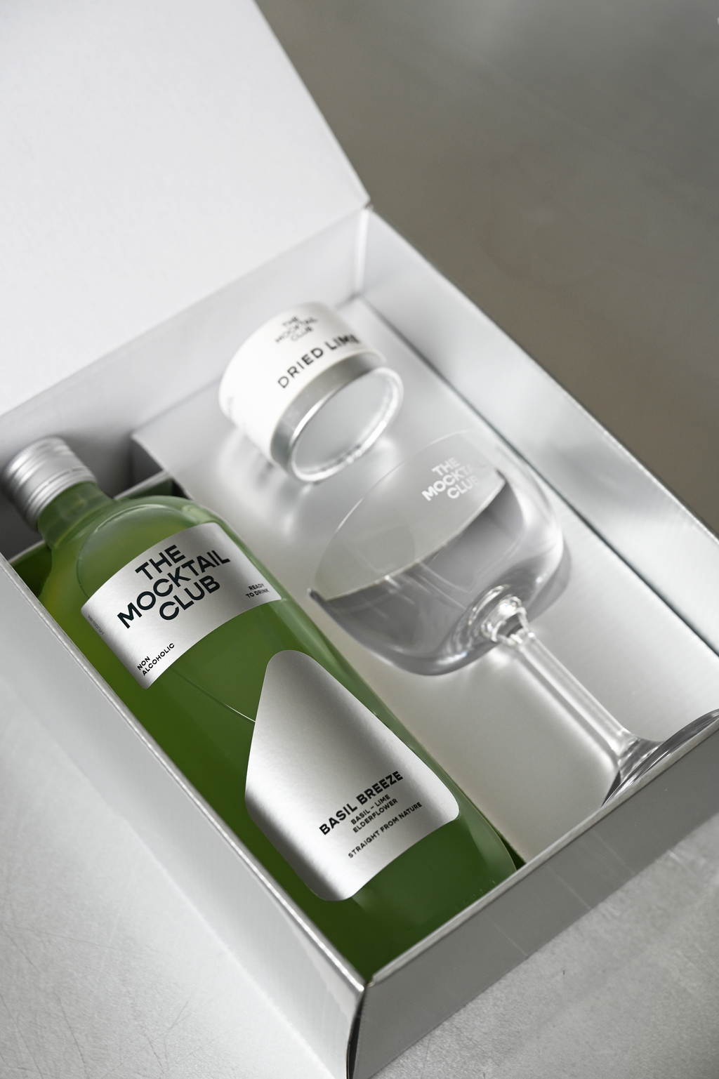 Everything you need to craft the perfect mocktail, all in one giftbox from The Mocktail Club. You’ll find refreshing Basil Breeze 99cl, a signature glass from The Mocktail Club, and a handpicked botanical to complete the experience.