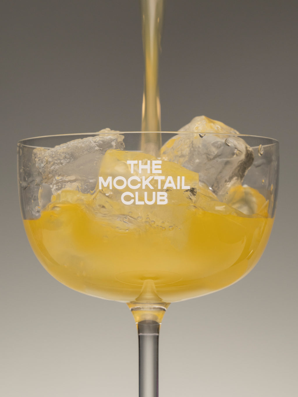 The Mocktail Club pouring Chil Charm in glass 