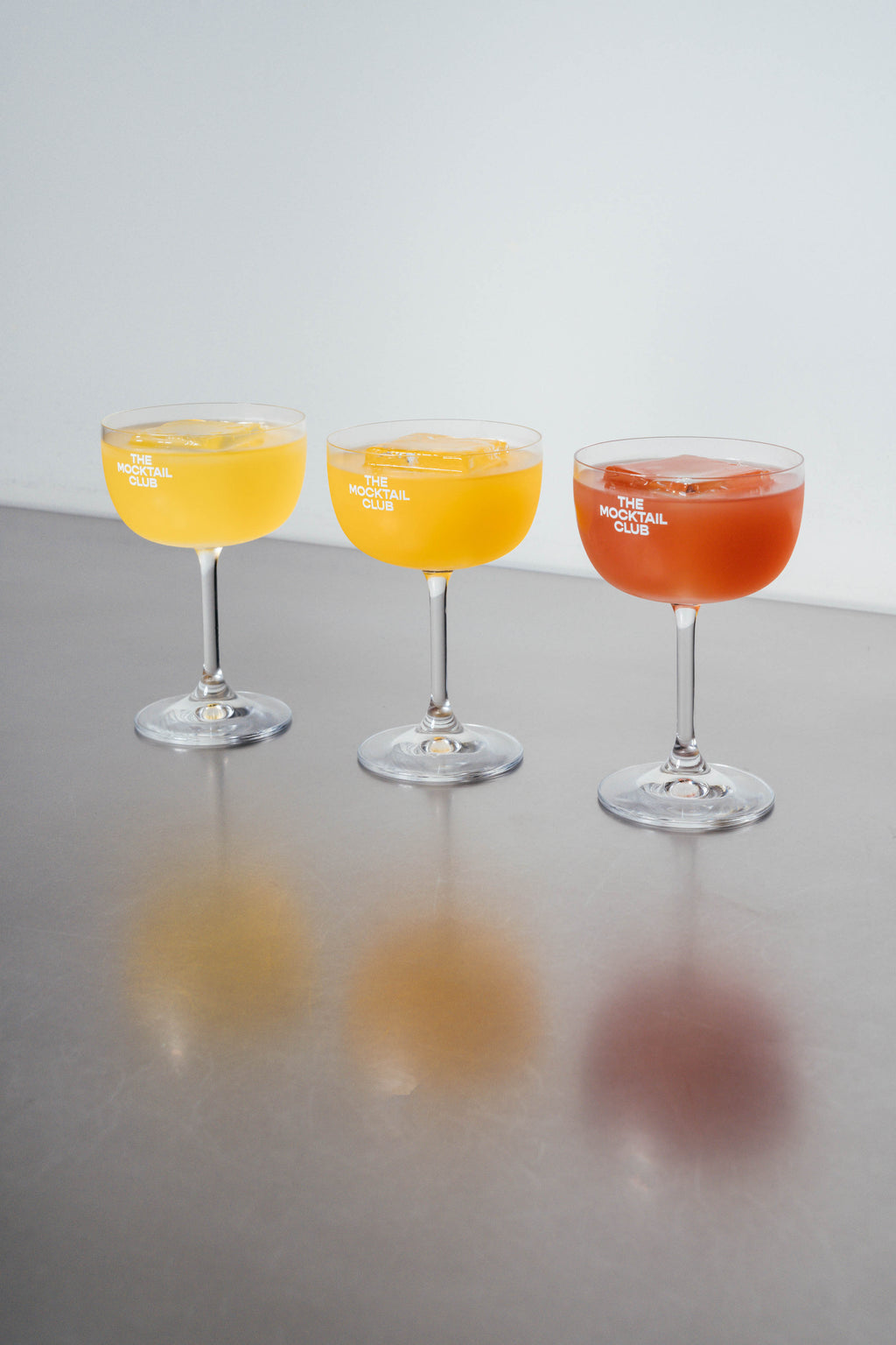 Three glasses of The Mocktail Club filled with mocktails 